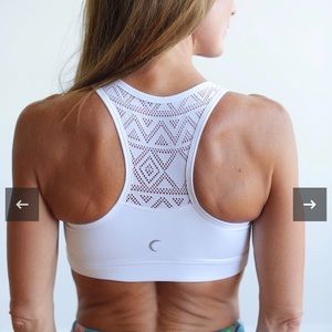 NEW—only tried on Zyia white bomber bra medium